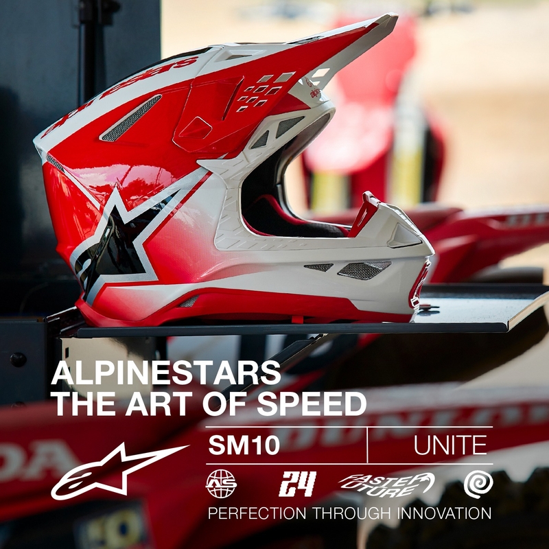 Alpinestars Supertech S-M10 Unite motokrosa ķivere sarkanā un baltā krāsā