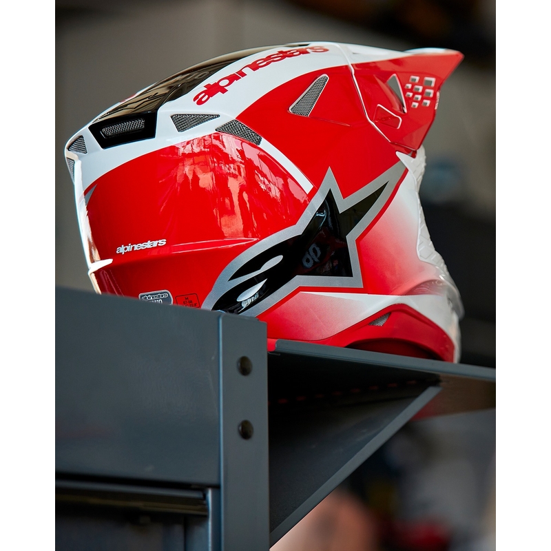 Alpinestars Supertech S-M10 Unite motokrosa ķivere sarkanā un baltā krāsā