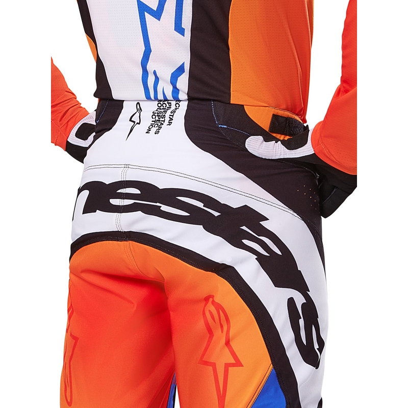 Alpinestars Techstar Melt motokrosa bikses oranžā un zilā krāsā