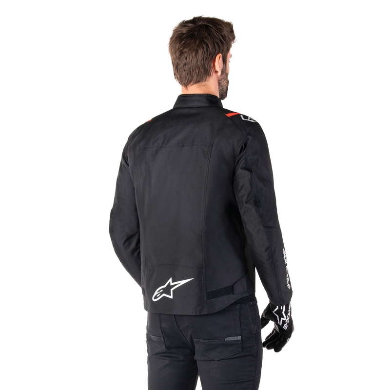 Alpinestars T-SPS 2 ūdensnecaurlaidīga melns-balts-fluo sarkans motocikla jaka