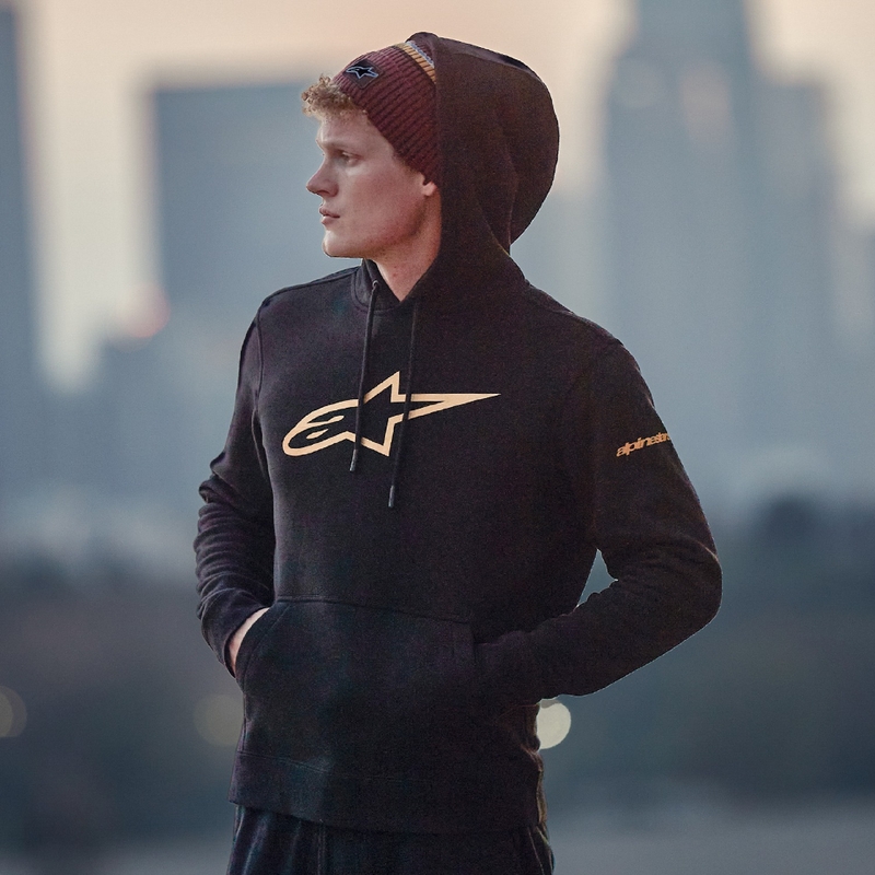 Alpinestars Gilded Hoodie melnā un zelta krāsā