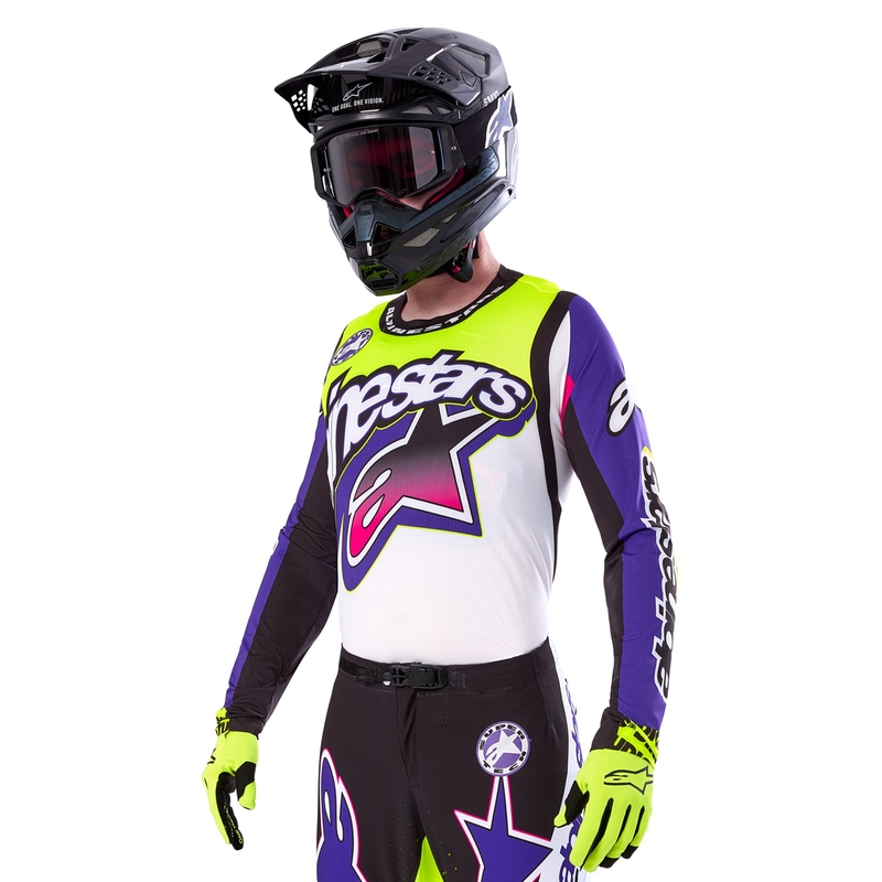 Alpinestars Supertech SX limitētā Dirt Studios balta-violeti-rozā-fluo dzeltena motokrosa krekliņš