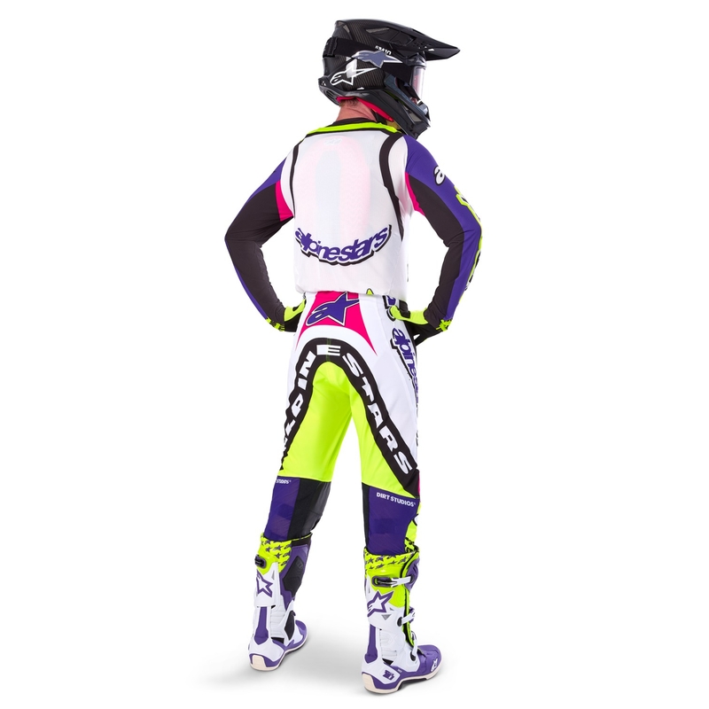 Alpinestars Supertech Dirt Studios baltās-violetās-rozā-fluo dzeltenās motokrosa bikses ar ierobežotu izlaidumu