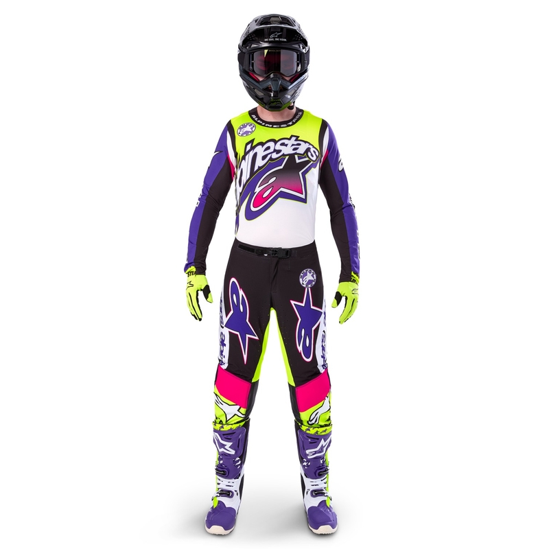 Alpinestars Supertech Dirt Studios baltās-violetās-rozā-fluo dzeltenās motokrosa bikses ar ierobežotu izlaidumu