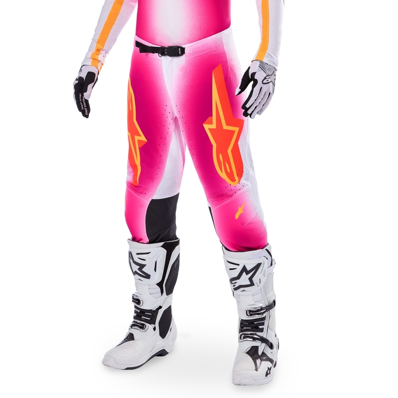 Alpinestars Supertech MIG fluo rozā-baltā-oranžā motokrosa bikses ierobežotā sērijā