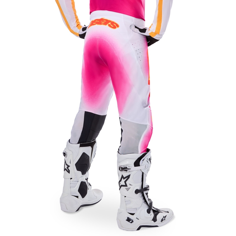 Alpinestars Supertech MIG fluo rozā-baltā-oranžā motokrosa bikses ierobežotā sērijā