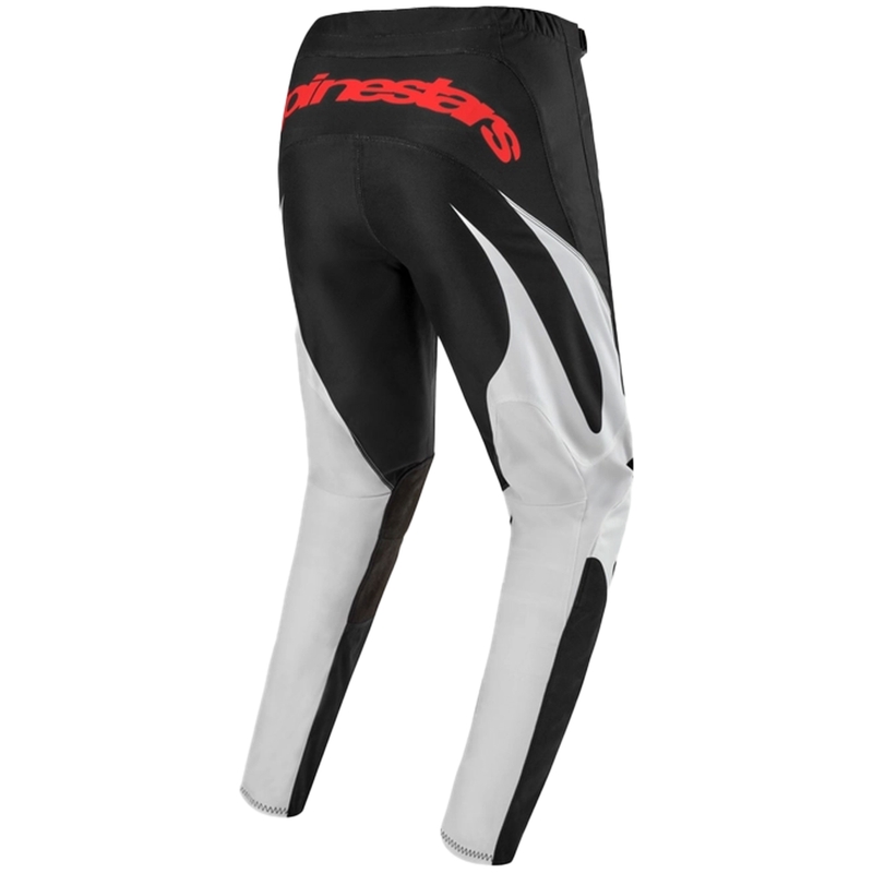 Alpinestars Fluid Lucent motokrosa bikses melnā, baltā un sarkanā krāsā