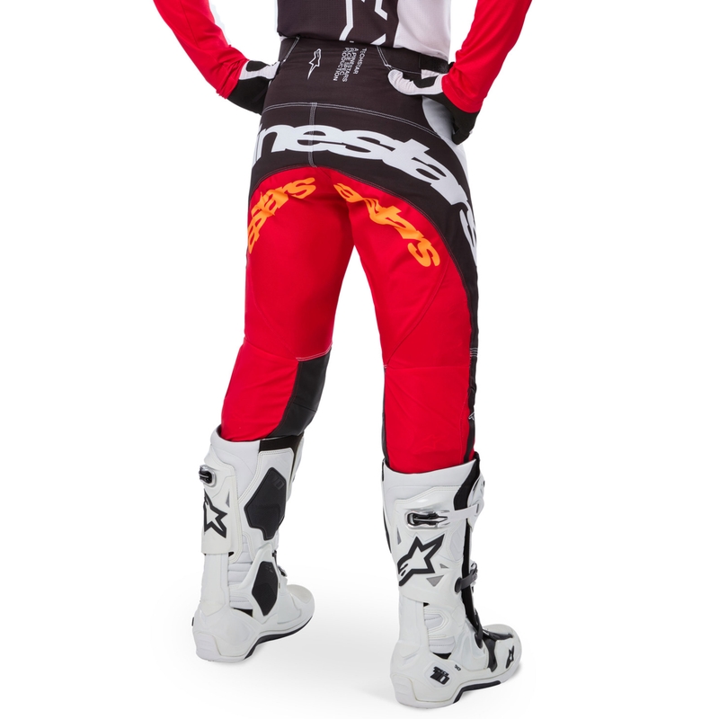 Alpinestars Techstar ierobežotas izlaiduma Deep melni-balti-fluo sarkani-oranžas motokrosa bikses