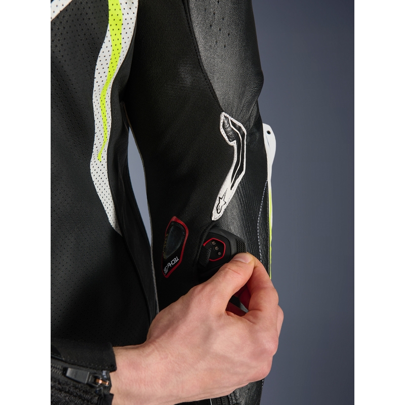 Alpinestars GP TECH V5 ādas motocikla kombinezons melns-balts-fluorescējošs dzeltens