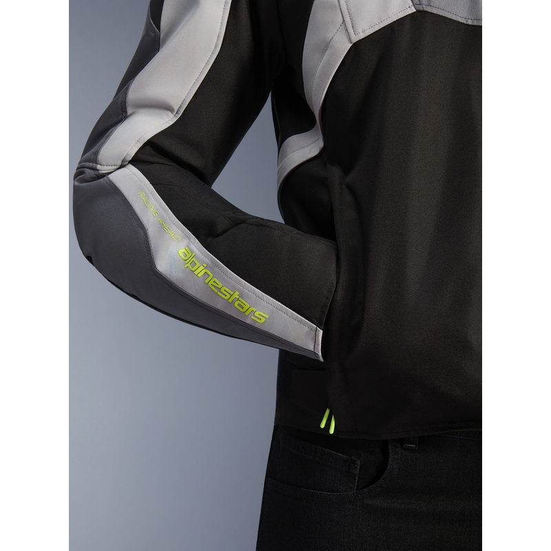 Alpinestars T-JAWS V4 ūdensnecaurlaidīga motocikla jaka melna-gaiši pelēka-pelēka