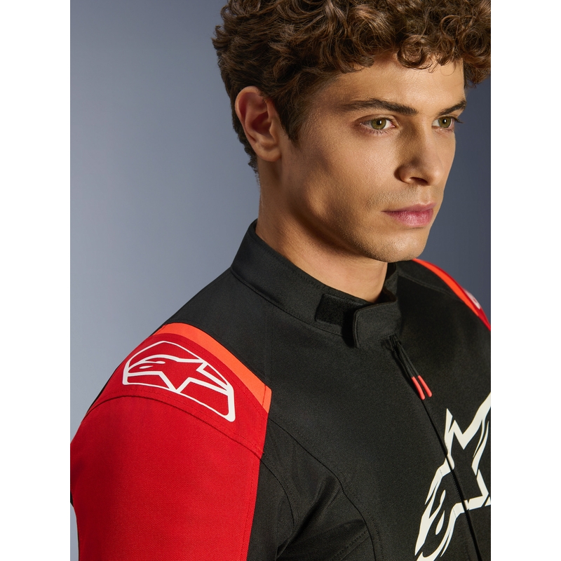 Alpinestars T-SPS 2 ūdensnecaurlaidīga motocikla jaka sarkana-melna-balta
